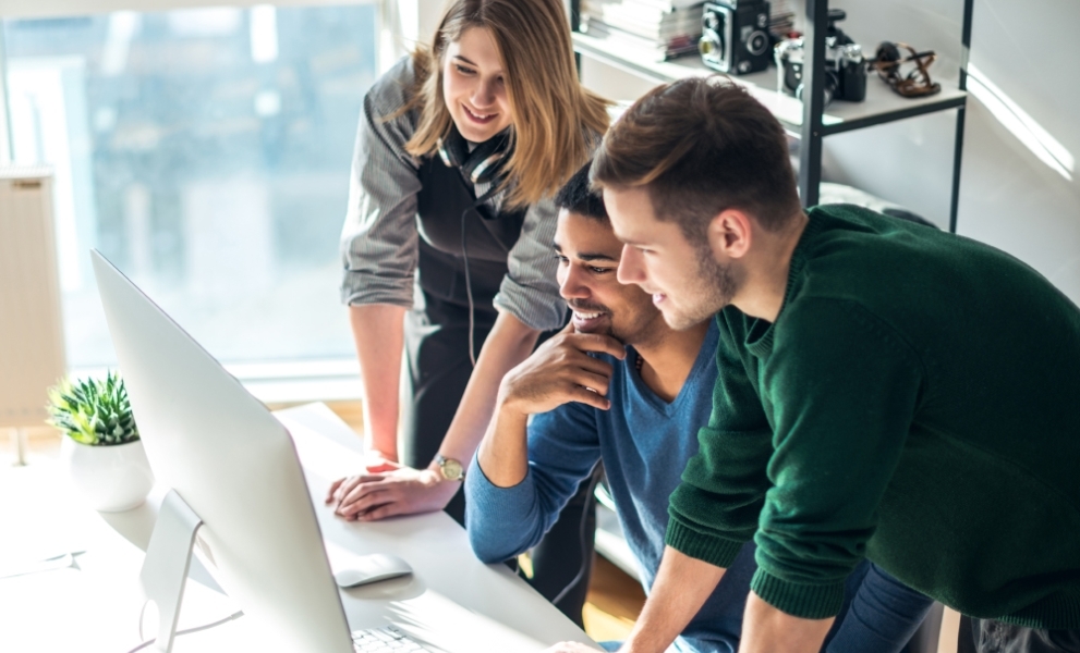 Hexicom Software Cloud Print Shop and Print Broker Management 1 three colleagues reviewing on screen content document capture lifestyle